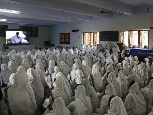 Catholic nuns follow the canonisation mass of Mother Teresa inside the Mother House, the Missionaries of Charity headquarters, in Kolkata. (AP Photo) Catholic nuns follow the canonisation mass of Mother Teresa inside the Mother House, the Missionaries of Charity headquarters, in Kolkata. (AP Photo)