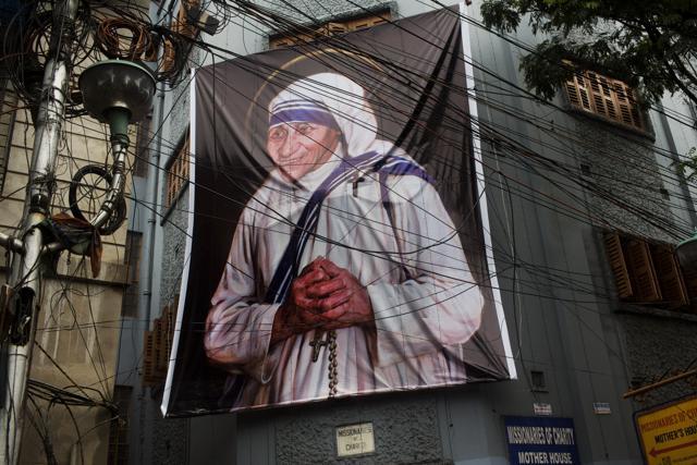 A giant picture of Mother Teresa is displayed outside the Missionaries of Charity Mother house in Kolkata. (AP Photo) A giant picture of Mother Teresa is displayed outside the Missionaries of Charity Mother house in Kolkata. (AP Photo)