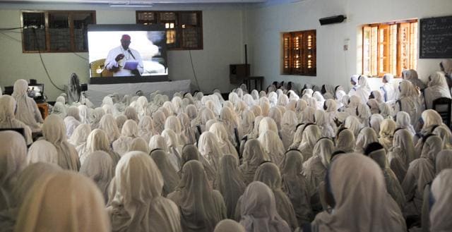 Indian nuns from the Catholic Order of the Missionaries of Charity watch a live telecast of the canonisation of Mother Teresa. (Subhankar Chakraborty/HT Photo) Indian nuns from the Catholic Order of the Missionaries of Charity watch a live telecast of the canonisation of Mother Teresa. (Subhankar Chakraborty/HT Photo)
