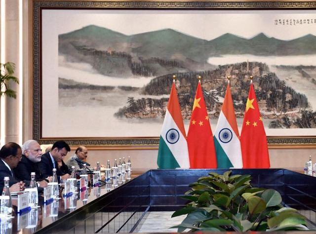 Prime Minister Narendra Modi and Chinese President Xi Jinping during a meeting at Westlake State House in Hangzhou, China on Sunday.(PTI) Prime Minister Narendra Modi and Chinese President Xi Jinping during a meeting at Westlake State House in Hangzhou, China on Sunday.(PTI)