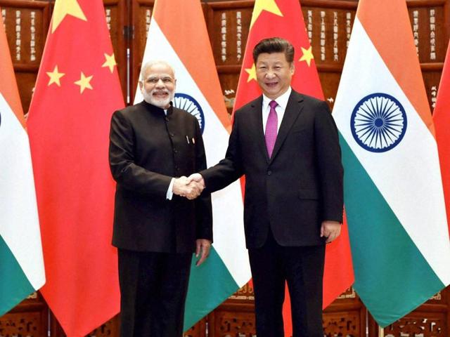 FACT CHECK: Does Image Show Chinese Premier Xi Jinping Holding Umbrella for  PM Modi? 