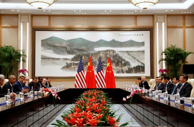 US President Barack Obama and China's President Xi Jinping, with their delegations, hold a bilateral meeting ahead of the G20 Summit, at West Lake State Guest House in Hangzhou, China. (Reuters ) US President Barack Obama and China's President Xi Jinping, with their delegations, hold a bilateral meeting ahead of the G20 Summit, at West Lake State Guest House in Hangzhou, China. (Reuters )