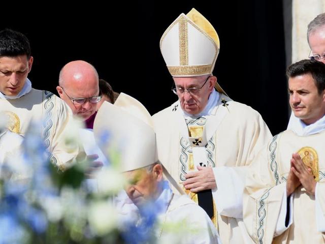 Mother Teresa elevation to Roman Catholicism's celestial pantheon comes in a canonisation mass in St Peter's square in the Vatican presided over by Pope Francis in the presence of 100,000 pilgrims.  (VINCENZO PINTO/AFP) 