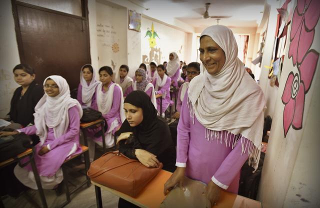 Thirty-nine-year-old Tanzeem Irshad attends a class at Shikhar Girls School. The school charges only Rs 900 as registration fee. (Raj K Raj/HT PHOTO)