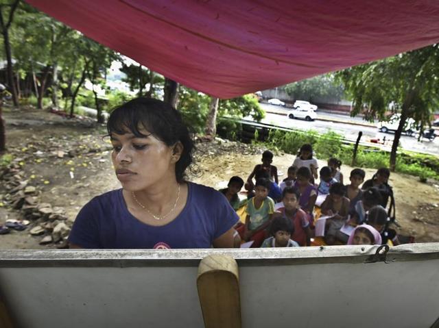 Near Pragati Maidan, 33-year-old Neetu Singh runs a school for underprivileged kids. (Raj K Raj/HT PHOTO)