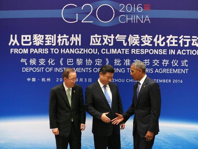 Chinese President Xi Jinping (C), US President Barack Obama (R) and UN Secretary General Ban Ki-moon shake hands during a joint ratification of the Paris climate change agreement ceremony ahead of the G20 Summit at the West Lake State Guest House in Hangzhou. (AFP Photo) Chinese President Xi Jinping (C), US President Barack Obama (R) and UN Secretary General Ban Ki-moon shake hands during a joint ratification of the Paris climate change agreement ceremony ahead of the G20 Summit at the West Lake State Guest House in Hangzhou. (AFP Photo)