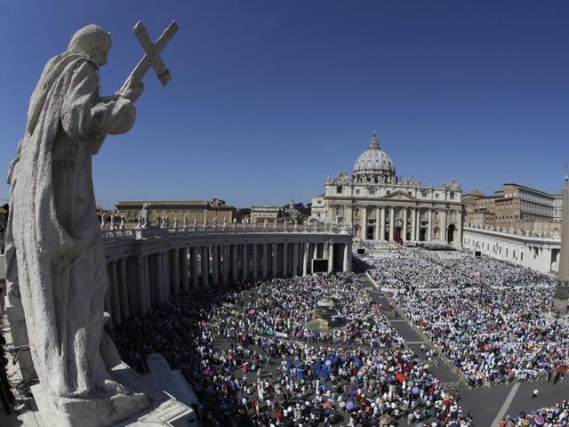 Hundreds of thousands crowd St. Peter's Square at the Vatican on Sunday as Pope Francis declared Mother Teresa a saint, honoring the tiny nun who cared for the world's most destitute as an icon for a Catholic Church that goes to the peripheries to find poor, wounded souls. (Alessandra Tarantino/AP) 