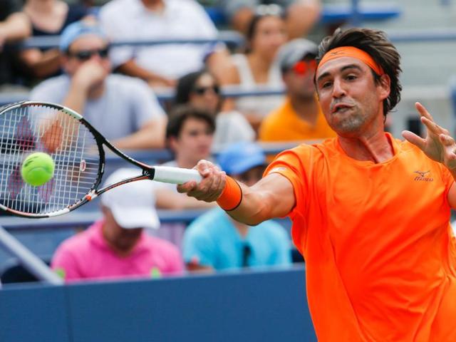 Marcos Baghdatis of Cyprus returns a shot to Gael Monfils of France. (AFP Photo) Marcos Baghdatis of Cyprus returns a shot to Gael Monfils of France. (AFP Photo)