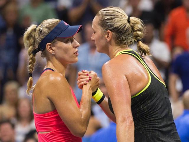 Angelique Kerber and Petra Kvitova embrace at the net after the match. (AFP)