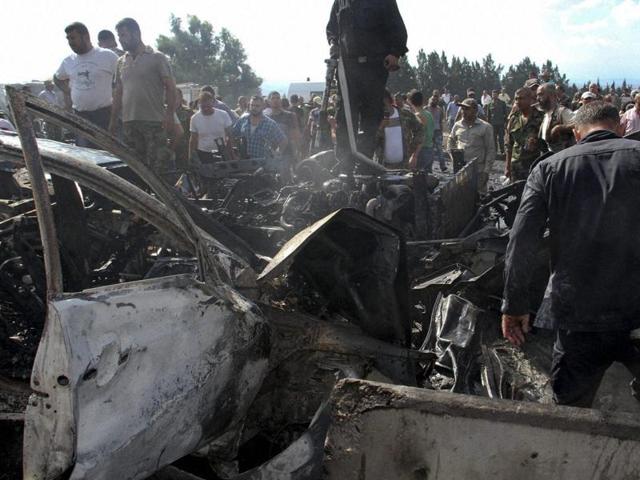 A handout picture released by the official Syrian Arab News Agency (SANA) on September 5, 2016 reportedly shows Syrians and security forces gathering at the site of a blast targeting the Arzuna bridge in a government-held area outside the Syrian city of Tartus. (AFP) A handout picture released by the official Syrian Arab News Agency (SANA) on September 5, 2016 reportedly shows Syrians and security forces gathering at the site of a blast targeting the Arzuna bridge in a government-held area outside the Syrian city of Tartus. (AFP)