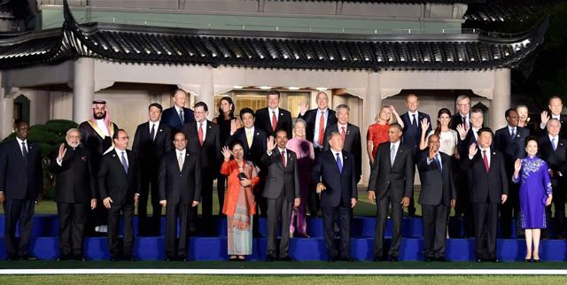 Prime Minister Narendra Modi with other G20 leaders and their spouses in a group photo during the G20 Summit in Hangzhou, China on Sunday. (PTI) Prime Minister Narendra Modi with other G20 leaders and their spouses in a group photo during the G20 Summit in Hangzhou, China on Sunday. (PTI)