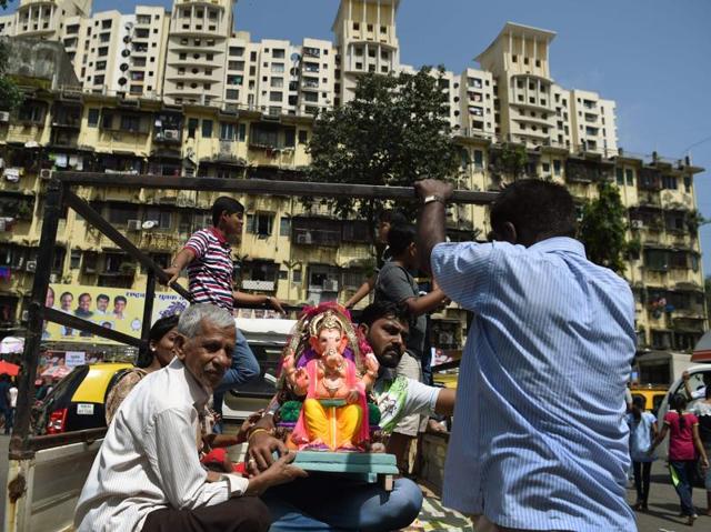 Ganesh Chaturthi celebration in a Mumbai colony. The 11-day festival  runs this year from September 5-15. (PUNIT PARANJPE/AFP) 