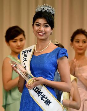 Priyanka Yoshikawa smiles as she holds the trophy after winning the Miss Japan title during the Miss World Japan 2016 Beauty Pageant in Tokyo on September 5, 2016. (AFP) Priyanka Yoshikawa smiles as she holds the trophy after winning the Miss Japan title during the Miss World Japan 2016 Beauty Pageant in Tokyo on September 5, 2016. (AFP)