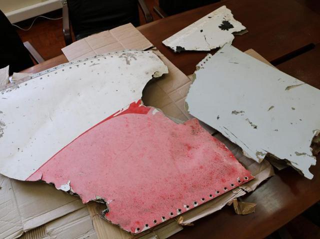 Three pieces of aircraft wreckage found off the east African coast of Mozambique are displayed at Mozambique's Civil Aviation Institute (IACM) in Maputo. (AFP Photo) Three pieces of aircraft wreckage found off the east African coast of Mozambique are displayed at Mozambique's Civil Aviation Institute (IACM) in Maputo. (AFP Photo)