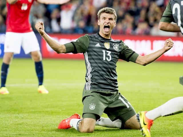 Thomas Muller celebrates after scoring Germany's third goal.(AP)