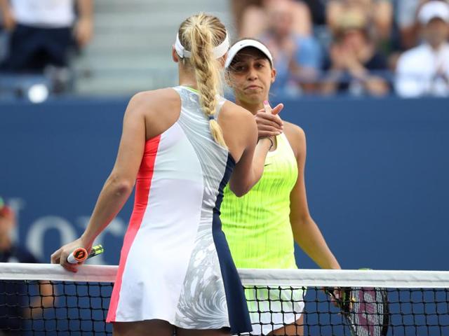 Wozniacki shakes hands with Madison Keys after the match. (Reuters)