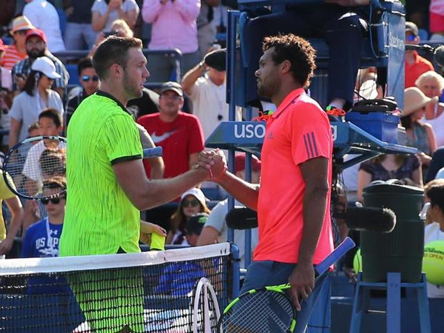 Tsonga shakes hands with Sock after the match. (Reuters)