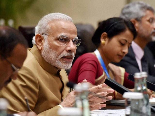 Prime Minister Narendra Modi during a meeting with UK Prime Minister Theresa May at the G20 summit in Hangzhou, China on Monday.(PTI Photo)