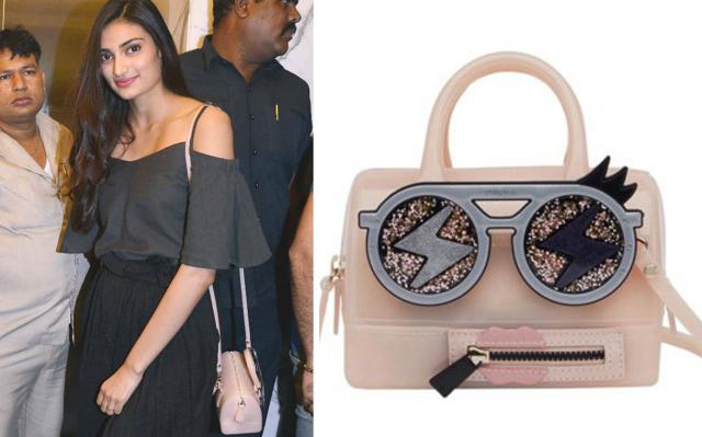 Athiya Shetty attented the screening of Dishoom wearing a Shift by Nimish Shah top paired with an Akaaro black skirt. White sneakers and a pink Furla bag finished out her look. How cute, right? Athiya Shetty attented the screening of Dishoom wearing a Shift by Nimish Shah top paired with an Akaaro black skirt. White sneakers and a pink Furla bag finished out her look. How cute, right?