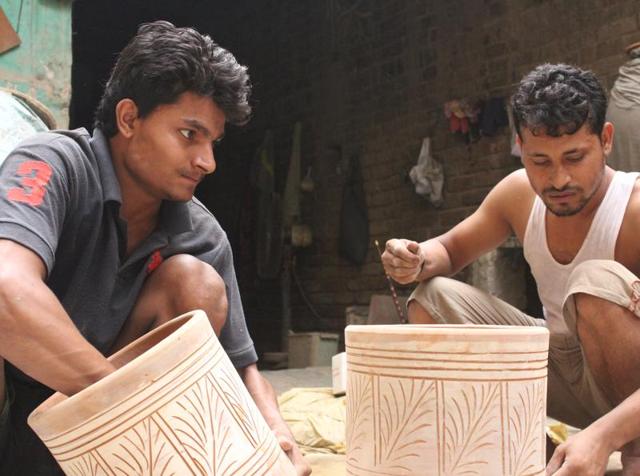 Potters from Uttam Nagar in New Delhi are involved in manufacturing clay filters.