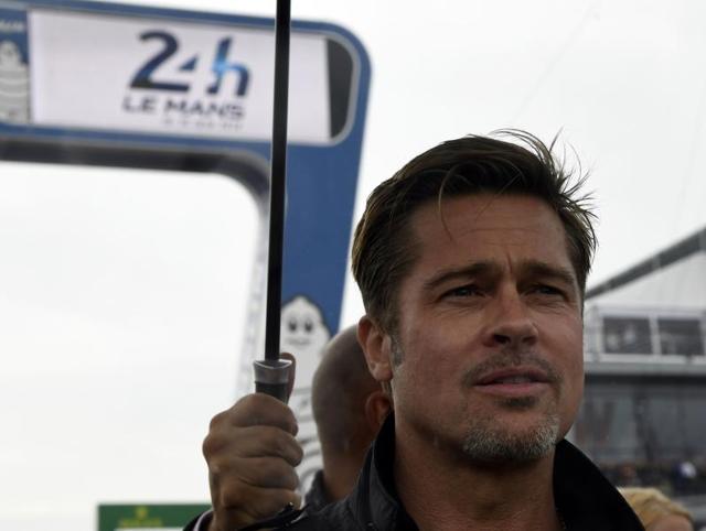 Brad Pitt removes his helmet after a full lap on the Le Mans 24 Hours circuit. (AFP) Brad Pitt removes his helmet after a full lap on the Le Mans 24 Hours circuit. (AFP)