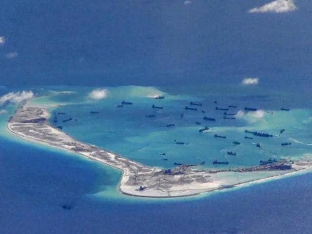 Chinese dredging vessels are purportedly seen in the waters around Mischief Reef in the disputed Spratly Islands in the South China Sea. (Reuters File Photo)