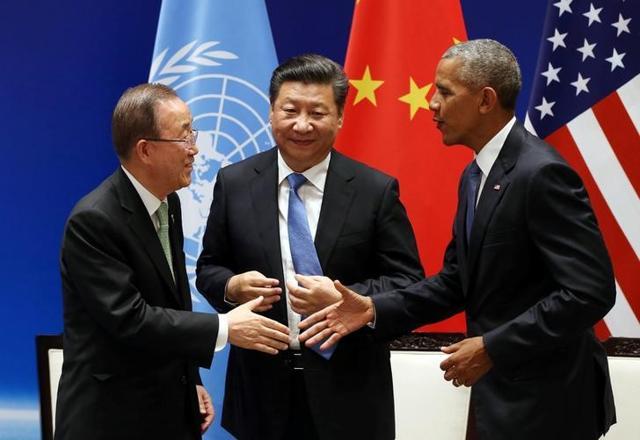 Chinese President Xi Jinping (C) shakes hands with US President Barack Obama and UN Secretary General Ban Ki-moon during a joint ratification of the Paris climate change agreement ceremony ahead of the G20 Summit at the West Lake State Guest House in Hangzhou, China, on September 3. (Reuters) Chinese President Xi Jinping (C) shakes hands with US President Barack Obama and UN Secretary General Ban Ki-moon during a joint ratification of the Paris climate change agreement ceremony ahead of the G20 Summit at the West Lake State Guest House in Hangzhou, China, on September 3. (Reuters)