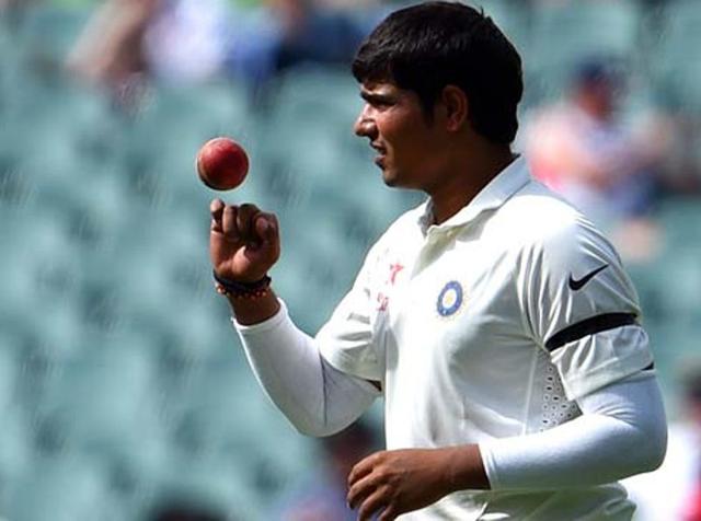 Leg spinner Karn Sharma came on early and finished with three wickets as India Blue dominated India Green and moved close to reaching the Duleep Trophy final on Tuesday. (AFP Photo) Leg spinner Karn Sharma came on early and finished with three wickets as India Blue dominated India Green and moved close to reaching the Duleep Trophy final on Tuesday. (AFP Photo)