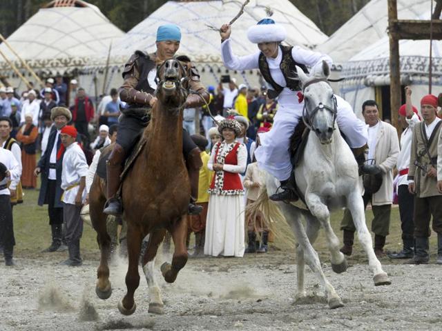 Participants take part in a horse-riding competition. (AP photo)