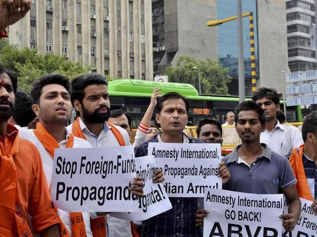 ABVP activists shout slogans at a protest against Amnesty International India in New Delhi, August 17 (PTI) ABVP activists shout slogans at a protest against Amnesty International India in New Delhi, August 17 (PTI)