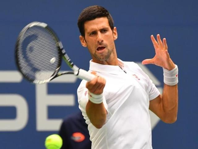 Novak Djokovic of Serbia hits a return in his match against Kyle Edmund of Great Britain. (AFP Photo) Novak Djokovic of Serbia hits a return in his match against Kyle Edmund of Great Britain. (AFP Photo)