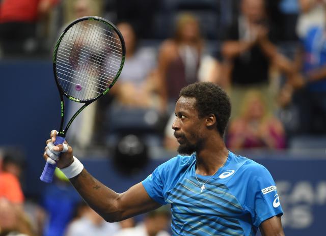 Gael Monfils celebrates his win over Lucas Pouille. (AFP)
