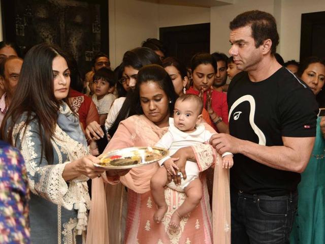 Arpita and Sohail perform aarti during Ganesha pooja on Tuesday in Mumbai. (Yogen Shah)
