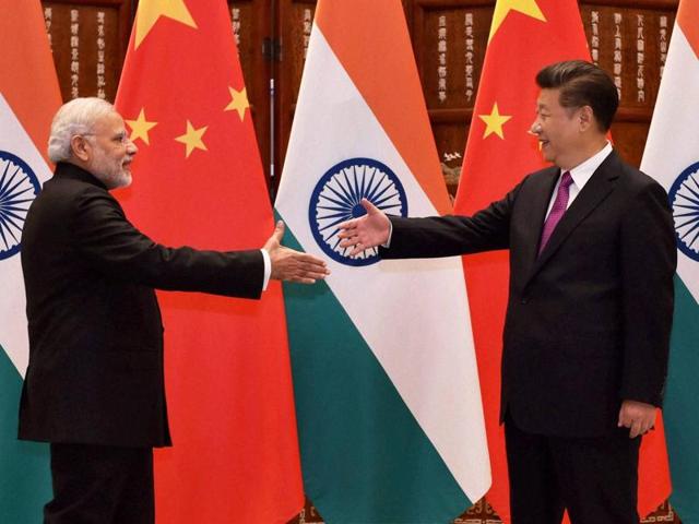 Prime Minister Narendra Modi and Chinese President Xi Jinping before their bilateral meeting in Hangzhou, China, on Sunday. (PTI) Prime Minister Narendra Modi and Chinese President Xi Jinping before their bilateral meeting in Hangzhou, China, on Sunday. (PTI)
