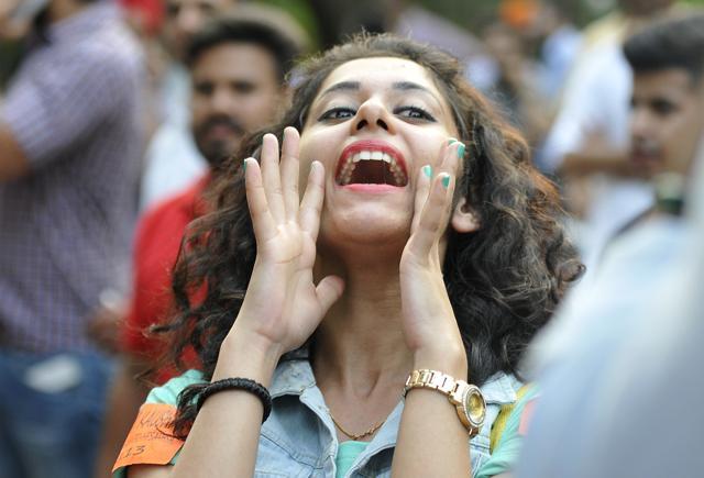 A PUSU supporter celebrating on the campus on Wednesday. (Karun Sharma/HT Photo)