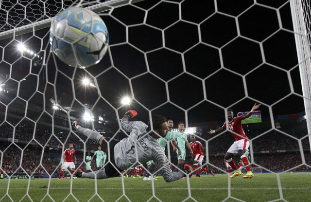 Breel Embolo heads in the first goal for Switzerland. (REUTERS) Breel Embolo heads in the first goal for Switzerland. (REUTERS)