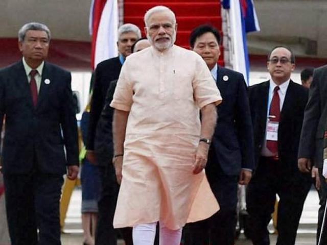 Prime Minister Narendra Modi arrives at Vientiane International airport in Laos. (PTI Photo) Prime Minister Narendra Modi arrives at Vientiane International airport in Laos. (PTI Photo)
