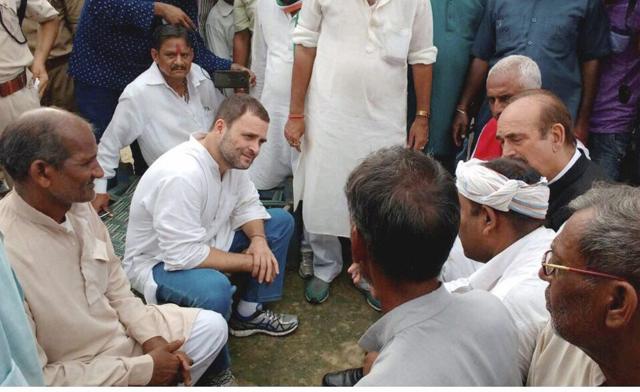 Congress vice-president Rahul Gandhi meeting with farmers at Khat pe Charcha programme during his Kisan Yatra in Deoria. (PTI) Congress vice-president Rahul Gandhi meeting with farmers at Khat pe Charcha programme during his Kisan Yatra in Deoria. (PTI)