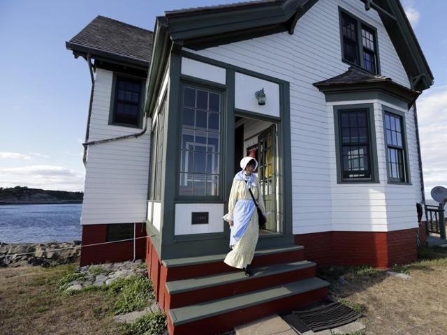 Sally steps from the keeper's house on Little Brewster Island in Boston Harbor. (AP)