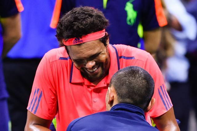 After getting his knee tended to at the end of the second set, Tsonga retired after double-faulting to start the third. (AFP)
