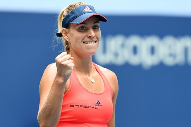 Angelique Kerber of Germany pumps her fist after winning against Roberta Vinci. (AFP Photo) Angelique Kerber of Germany pumps her fist after winning against Roberta Vinci. (AFP Photo)