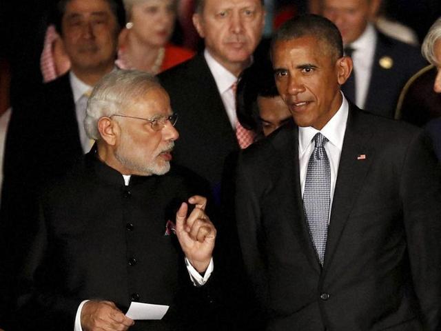 Obama chats with Modi as they and other leaders arrive for a family photo at the Xizi hotel in Hangzhou in eastern China's Zhejiang province,  on Sept. 4, 2016.  (AP) 