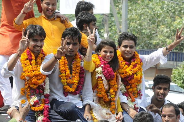 Delhi University Students’ Union outgoing president Satender Awana (left) is pursuing Buddhist studies . Awana is seen here with other DUSU 2015 office bearers.(Hindustan Times)