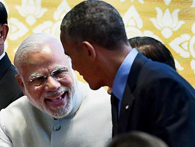 Prime Minister Narendra Modi and US President Barack Obama greet each other during the group photo session at the 11th East Asia summit in Vientiane, Laos. (PTI) Prime Minister Narendra Modi and US President Barack Obama greet each other during the group photo session at the 11th East Asia summit in Vientiane, Laos. (PTI)