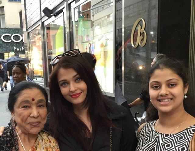 In this file photo from July, Asha poses with Ashwarya Rai Bachchan, whom she bumped into while they in New York. (Twitter)