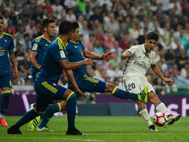 Real Madrid's forward Alvaro Morata (R) kicks the ball to score during the Spanish league football match. (AFP Photo) Real Madrid's forward Alvaro Morata (R) kicks the ball to score during the Spanish league football match. (AFP Photo)