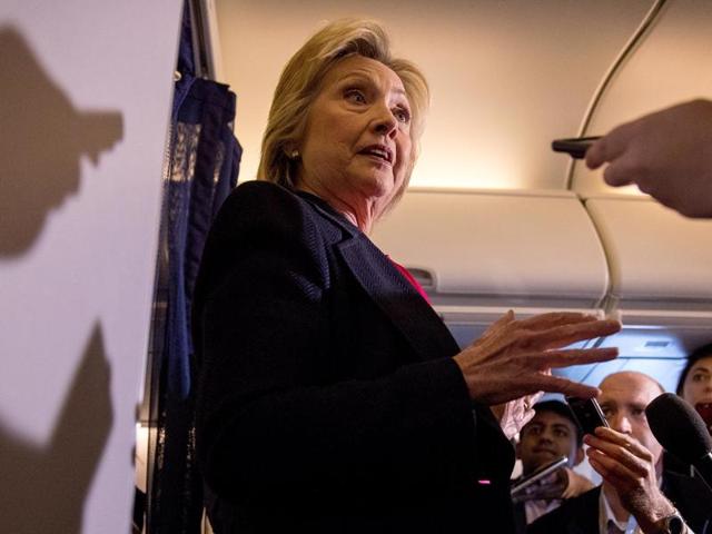 Democratic presidential candidate Hillary Clinton speaks to media on board her campaign plane as she travels to Tampa. (AP) Democratic presidential candidate Hillary Clinton speaks to media on board her campaign plane as she travels to Tampa. (AP)