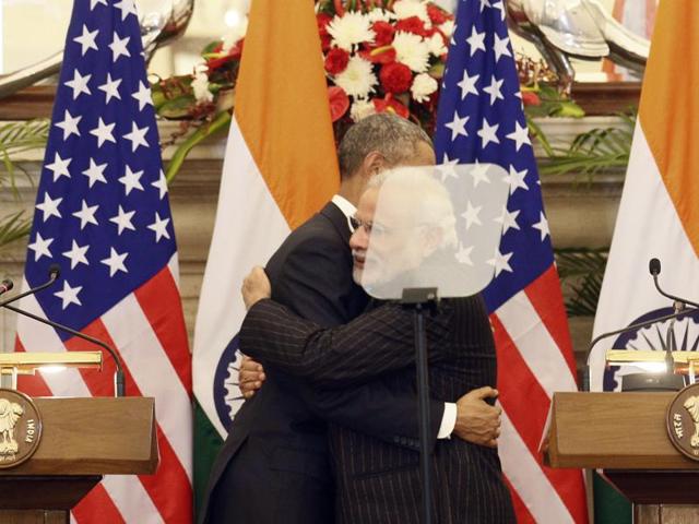 Obama and Modi hug after speaking to the press at Hyderabad House in Delhi on January 25, 2015.  (Hindustan Times) 