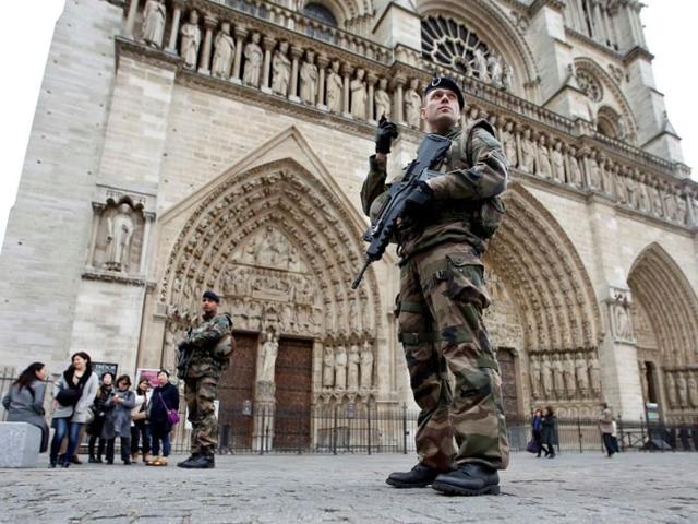 An armed French soldier patrols in front of Notre Dame Cathedral in Paris. (REUTERS) An armed French soldier patrols in front of Notre Dame Cathedral in Paris. (REUTERS)