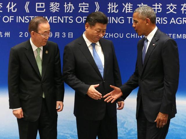 Chinese president Xi Jinping shakes hands with US president Barack Obama as UN secretary general Ban Ki-moon looks on during a joint ratification of the Paris climate change agreement ahead of the G20 Summit in Hangzhou on September 3, 2016. (AFP Photo) Chinese president Xi Jinping shakes hands with US president Barack Obama as UN secretary general Ban Ki-moon looks on during a joint ratification of the Paris climate change agreement ahead of the G20 Summit in Hangzhou on September 3, 2016. (AFP Photo)